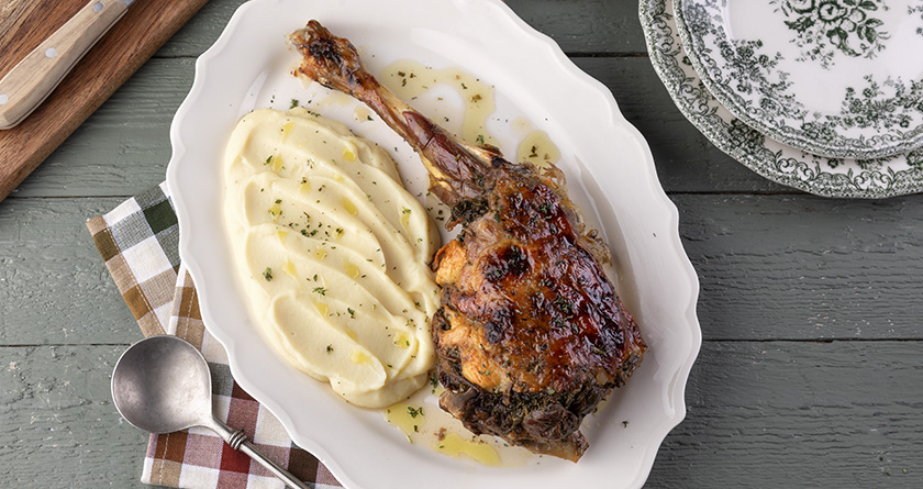 Herb-stuffed leg of lamb